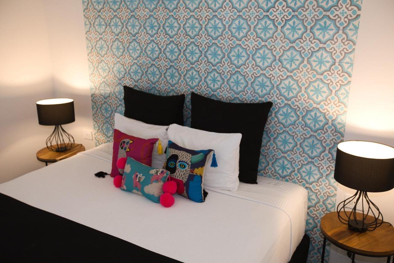 Casa Chukum Hotel บากาลาร์ ภายนอก รูปภาพ A bed with cushions